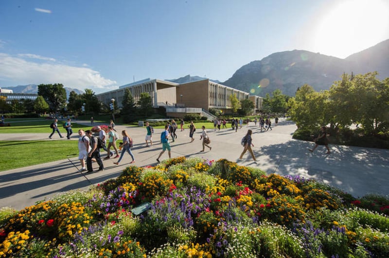 FILE: Students walk on the BYU campus. finalized plans for a new pool that will fit in the current space of the university's existing aquatic facility.
