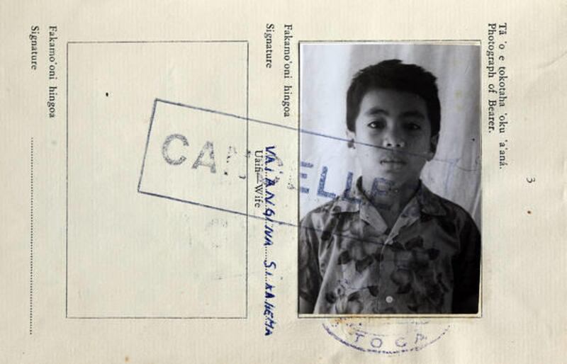Vai Sikahema's passport, taken when he immigrated from Tonga as a boy, is the oldest photo he has of himself.