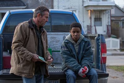 Hal (Dennis Quaid, left) and Eli (Myles Truitt, right) in “Kin."