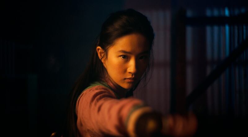 This image released by Disney shows Yifei Liu in the title role of “Mulan.” The film is no longer headed for a major theatrical release. The Walt Disney Co. said Tuesday that it will debut its live-action blockbuster on its subscription streaming service, Disney Plus, on Sept. 4. Customers will have to pay an additional $29.99 on top of the cost of the monthly subscription to rent “Mulan.”