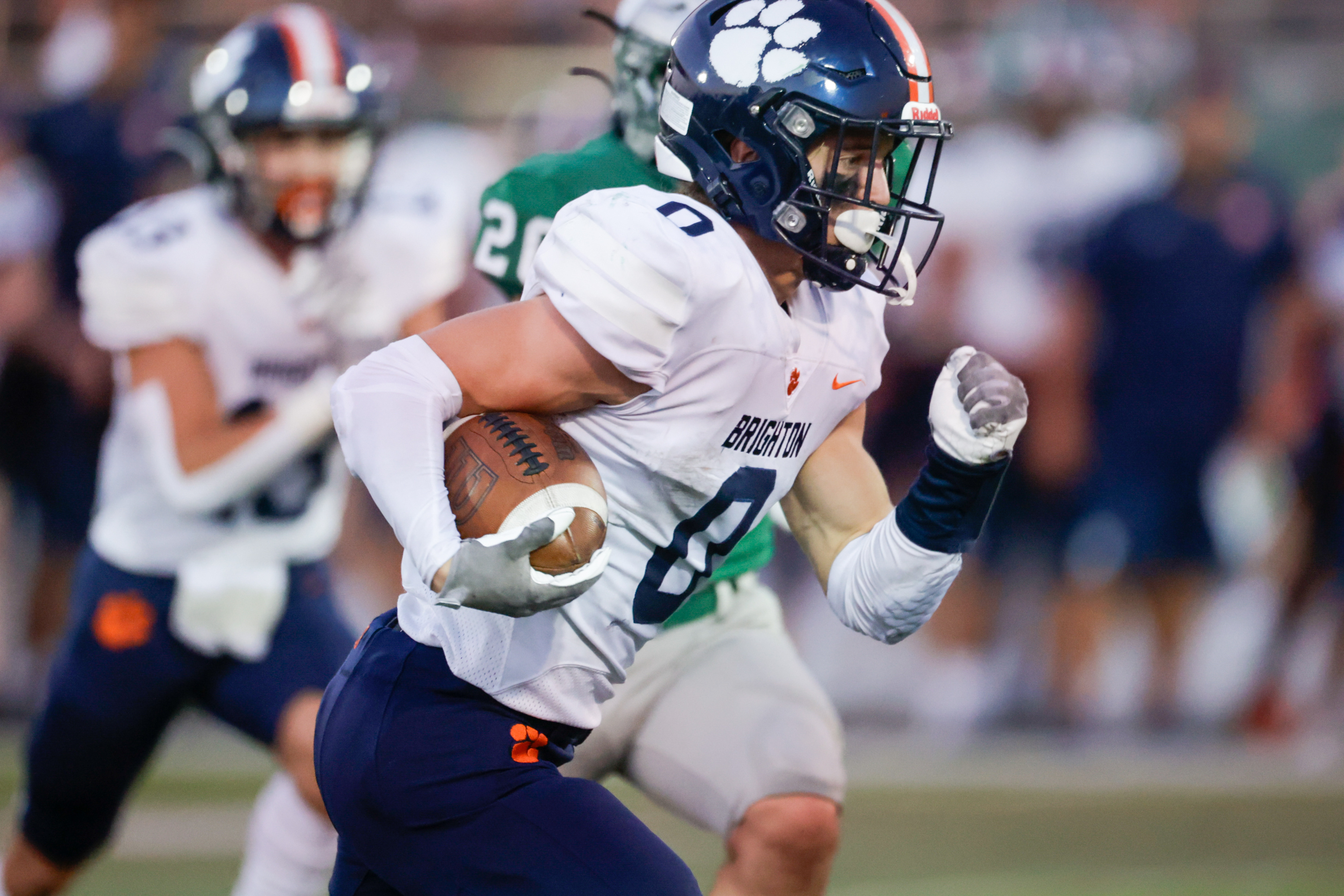 Brighton defeated Olympus in prep football action, 28-17.