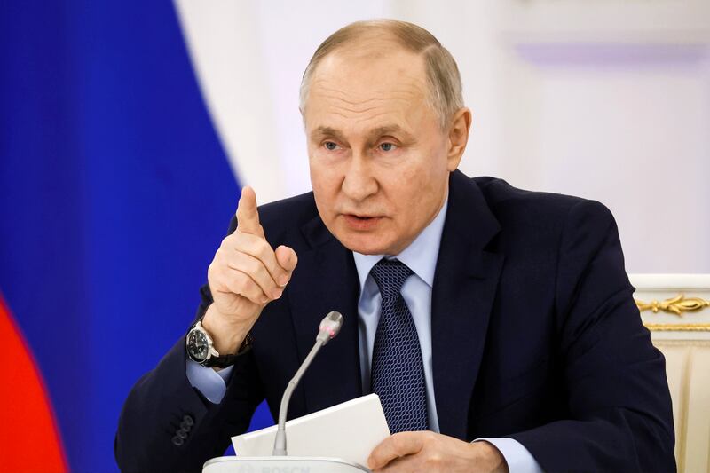 Russian President Vladimir Putin gestures at a meeting of the State Council at the Kremlin in Russia on Dec. 27, 2023.