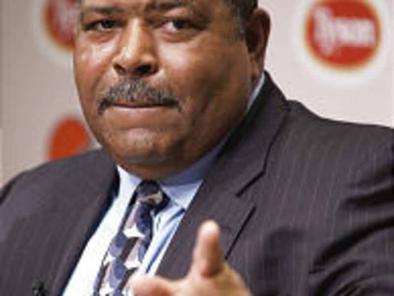 Cleveland Browns new head coach Romeo Crennel answers questions at a news conference.