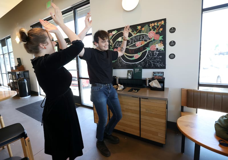 Brittany Glazier and Jacob Lawson celebrate vote in favor of unionizing at a Starbucks in Cottonwood Heights.