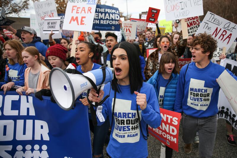 FILE - Ermiya Fanaeian, 17, a student at Salt Lake School for the Performing Arts, joins others in the "March for Our Lives" in Salt Lake City on Saturday, March 24, 2018. Thousands of protesters marched from West High School to the Capitol to advocate fo