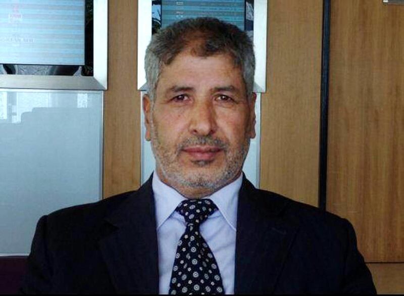In this photo taken in 2013 and provided by the anti-government activist group of the Media Office for the Revolutionary Command Council in Quneitra and Golan, which has been authenticated based on its contents and other AP reporting, shows Brig. Gen. Abd