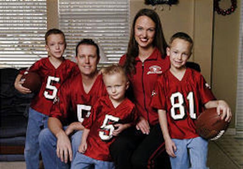 San Francisco 49ers cheerleader Tiffany Hutchinson with her family.