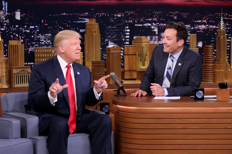 In this image released by NBC, Republican presidential candidate Donald Trump appears with host Jimmy Fallon during a taping of "The Tonight Show Starring Jimmy Fallon," Thursday, Sept. 15, 2016, in New York. (Andrew Lipovsky/NBC via AP)