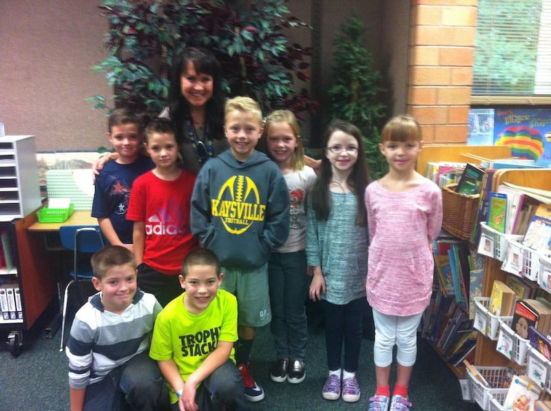 Third-grade teacher Andrea Wood has a unique class this year at Columbia Elementary School in Kaysville: four sets of twins make up one-third of the class. They include (pictured standing, from left to right) Bennet and Aiden Campbell, Logan and Gracie Su