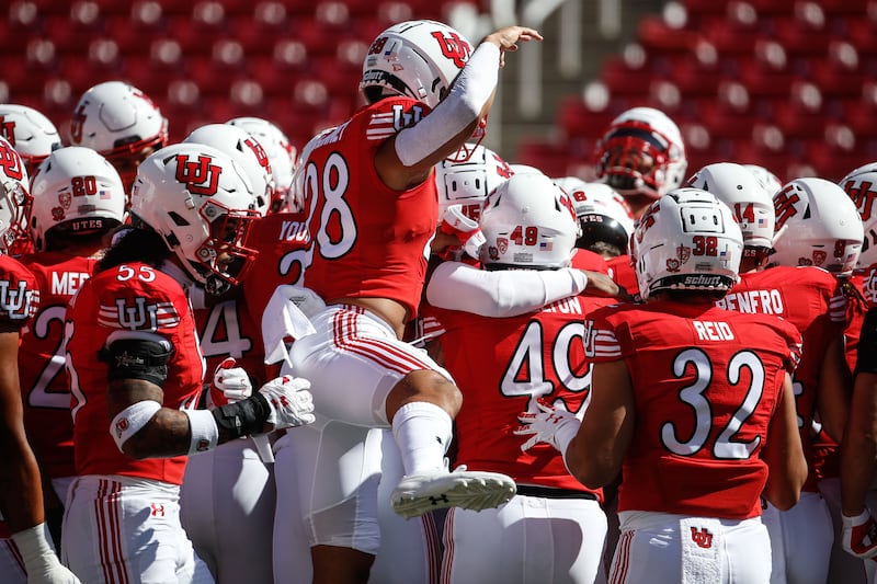 Utah football team warms-up before they compete against Washington State.