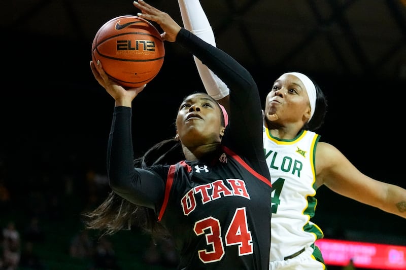 Utah’s Dasia Young (34) goes up for a shot against Baylor’s Sarah Andrews during the first half of an NCAA college basketball game, Tuesday, Nov. 14, 2023, in Waco, Texas.