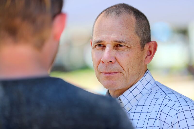 FILE - Rep. John Curtis greets potential voters in Orem on Saturday, June 9, 2018.