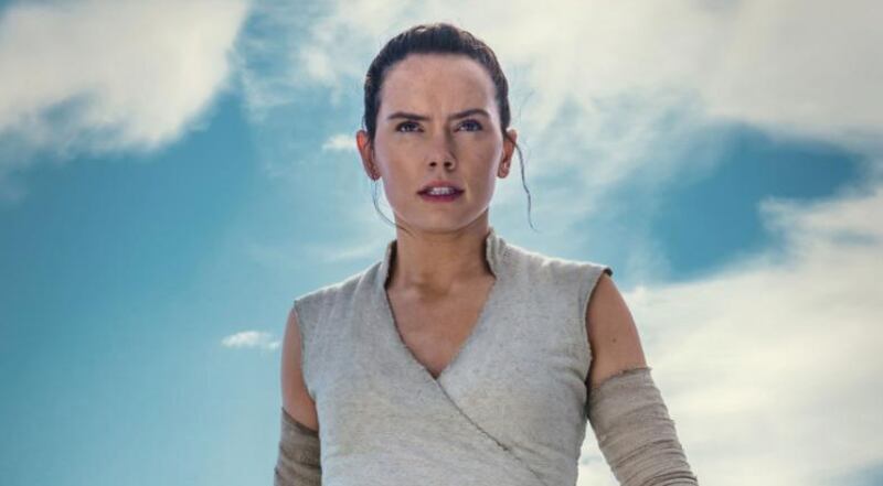 Rey is back with a lightsaber in her new photo for “Rise of Skywalker.”