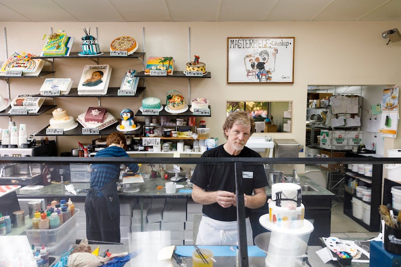 Jack Phillips, owner of Masterpiece Cakeshop in Lakewood, Colorado, decorates a cake for a client on Sept. 21, 2017.
