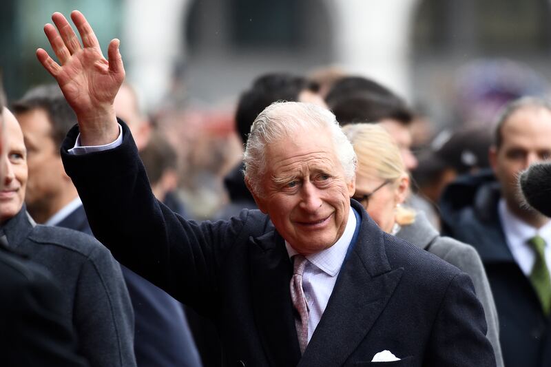 Britain’s King Charles III waves as he arrives at the city hall in Hamburg, Germany.