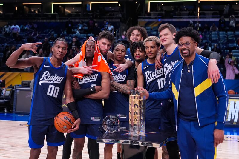 Team Jalen celebrates after winning the championship game of the NBA basketball Rising Stars event in Indianapolis, Friday, Feb. 16, 2024.