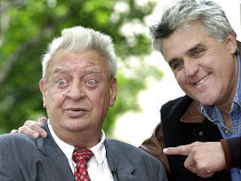 Comedian and actor Rodney Dangerfield, left, is acknowledged by Jay Leno in 2002. Dangerfield was 82 when he died.