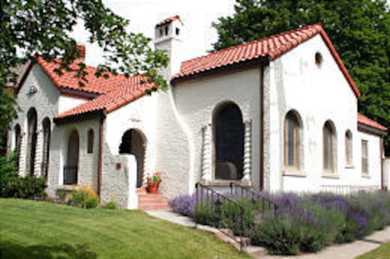 This Salt Lake home built in the early part of the 20th century exemplifies the Eclectic Movement. The influence of Spanish architecture is seen in the tile roof, minimal roof overhang, stucco walls and arched accents. Often used in the warmer climates of