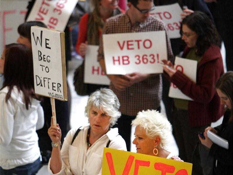 Protesters show their dislike for the sex education bill HB363 at the state Capitol Wednesday March 14, 2012 in Salt Lake City.