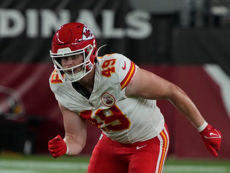 Kansas City Chiefs tight end Matt Bushman (49) lines up against the Arizona Cardinals during the first half of an NFL preseason football game.
