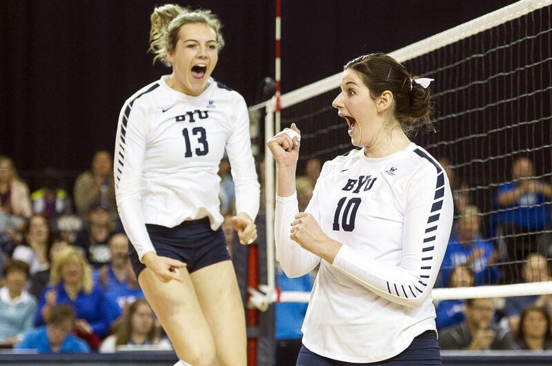 BYU middle hitter Amy Boswell, right, celebrates with outside hitter Danelle Parady-Stetler during an NCAA volleyball playoff game against UNLV in Provo on Saturday, Dec. 3, 2016. BYU swept UNLV 3-0 to advance onto the Sweet 16.