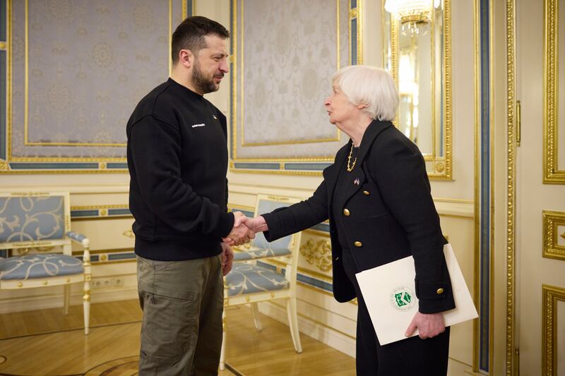 Ukrainian President Volodymyr Zelenskyy and U.S. Treasury Secretary Janet Yellen shake hands in Kyiv, Ukraine, Feb. 27, 2023.