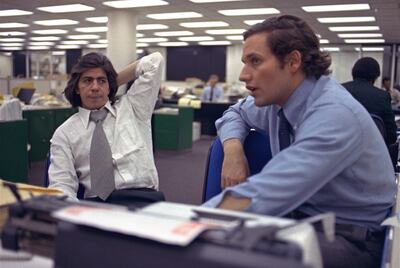 Reporters Bob Woodward, right, and Carl Bernstein, whose reporting of the Watergate case won them a Pulitzer Prize, sit in the newsroom of The Washington Post on May 7, 1973. Woodward and Elder D. Todd Christofferson of The Church of Jesus Christ of Latte