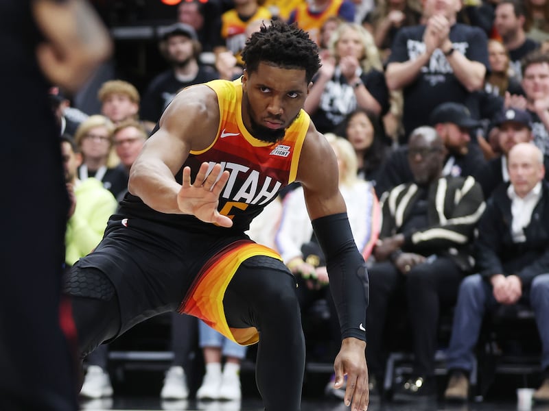 Utah Jazz guard Donovan Mitchell (45) gets up after falling during Game 6 of the NBA playoffs in Salt Lake City on Thursday, April 28, 2022.