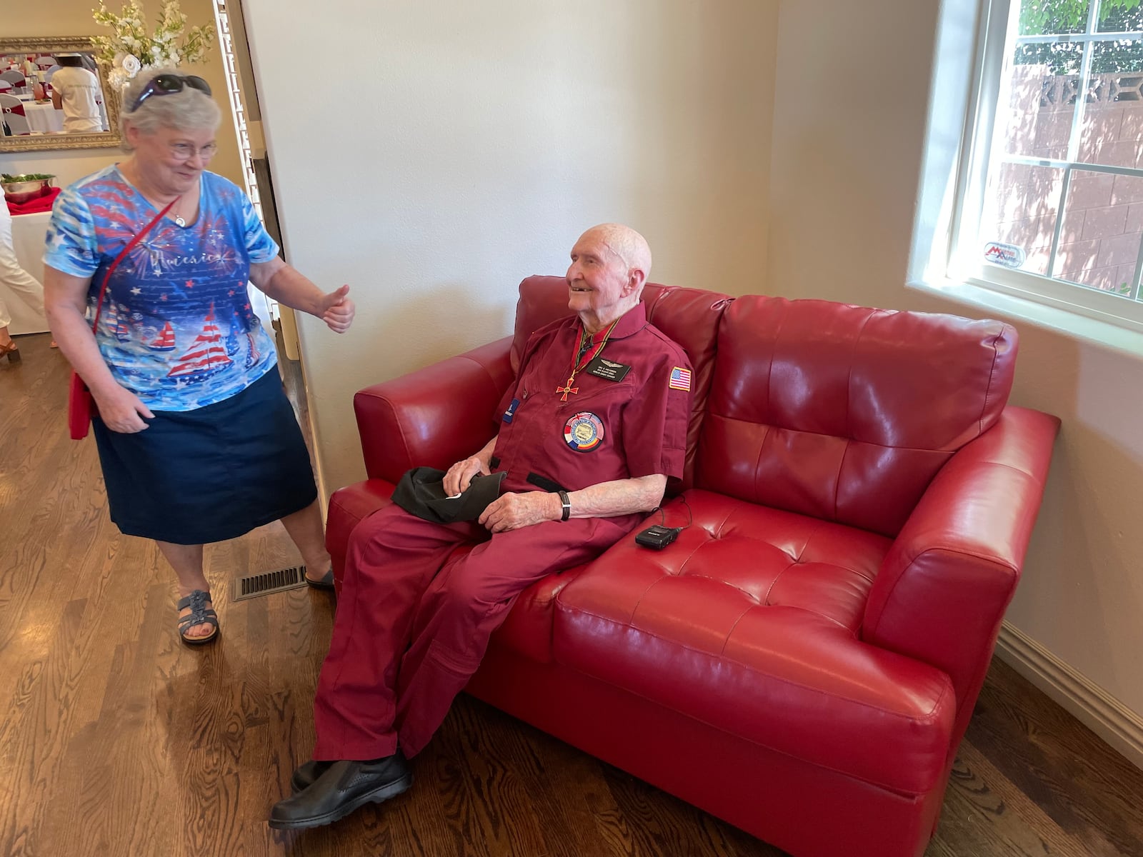 Gail Halvorsen, better known as the Candy Bomber, greets Regine Lovely in St. George on July 3.