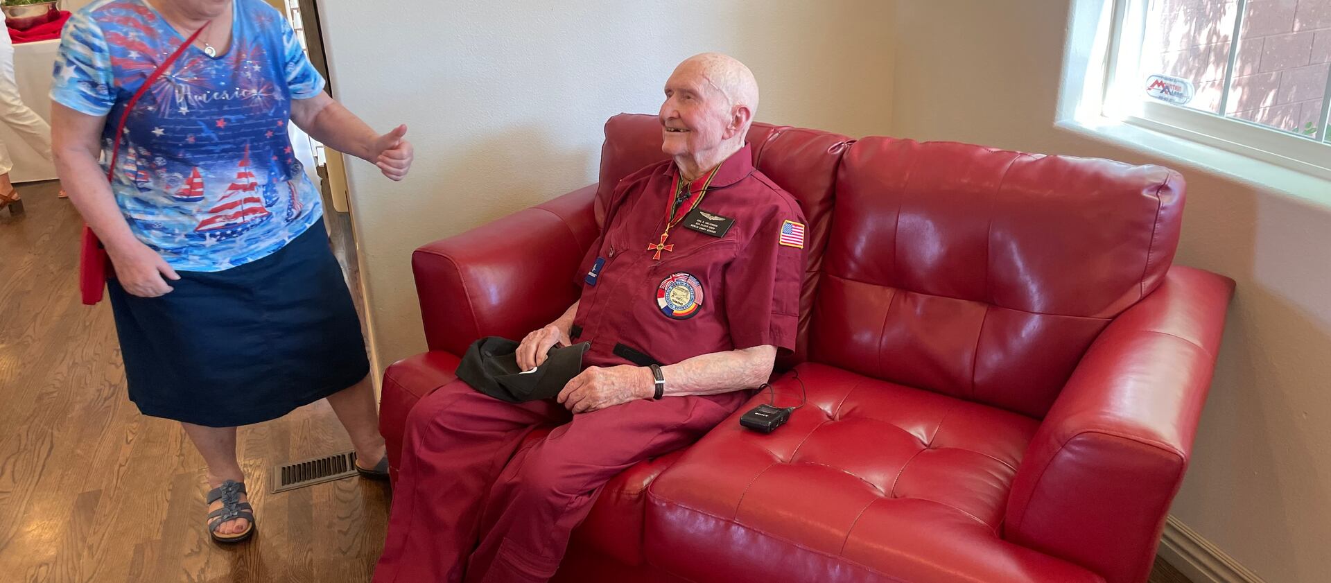Gail Halvorsen, better known as the Candy Bomber, greets Regine Lovely in St. George on July 3.