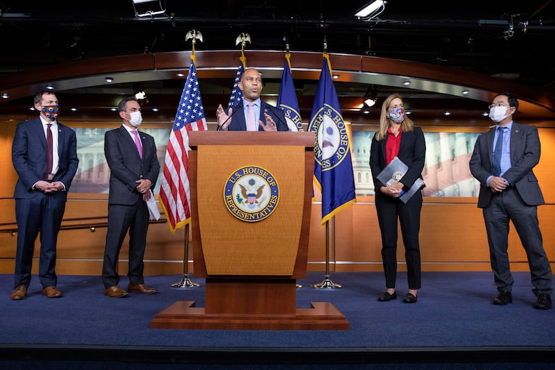 Rep. Hakeem Jeffries, D-N.Y., speaks to the press on Capitol Hill in Washington, Tuesday, Aug. 24, 2021.