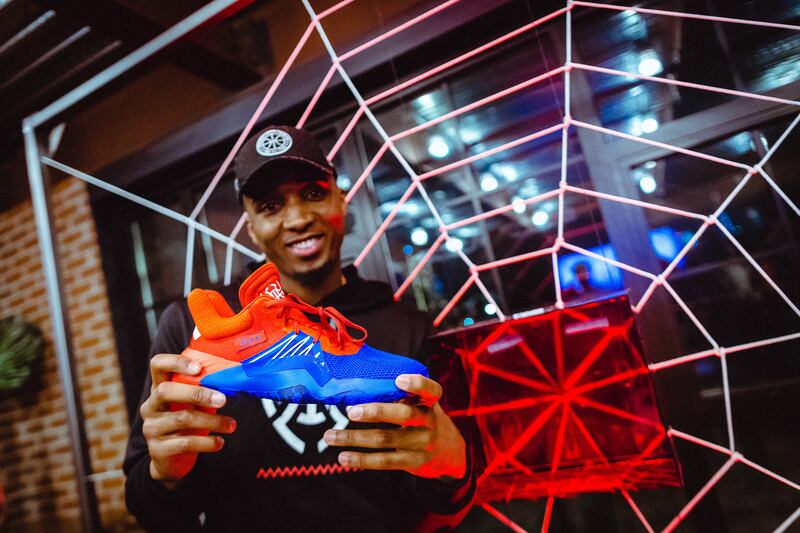 Donovan Mitchell shows off his D.O.N Issue #1 signature shoe.