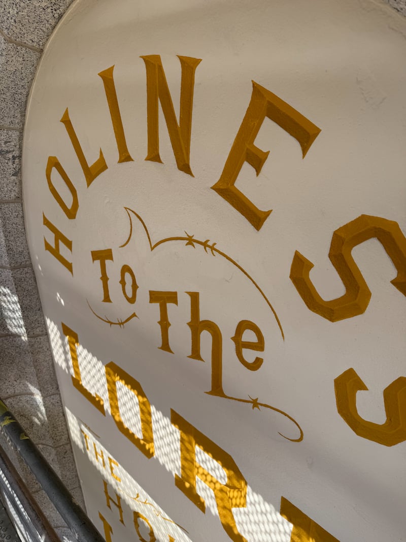 Restoration work underway on the "Holiness to the Lord" panel on the Salt Lake Temple on Tuesday, July 22, 2025.
