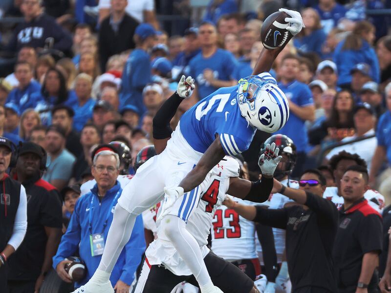Brigham Young Cougars wide receiver Darius Lassiter (5) makes a one handed catch against the Texas Tech Red Raiders in Provo on Saturday, Oct. 21, 2023.