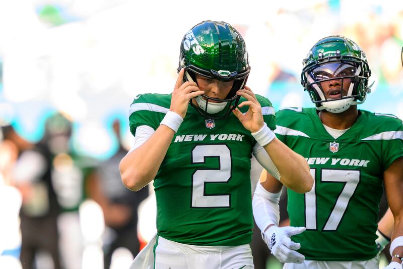 New York Jets quarterback Zach Wilson (2) looks down at the field during a game against the Miami Dolphins in December 2023.