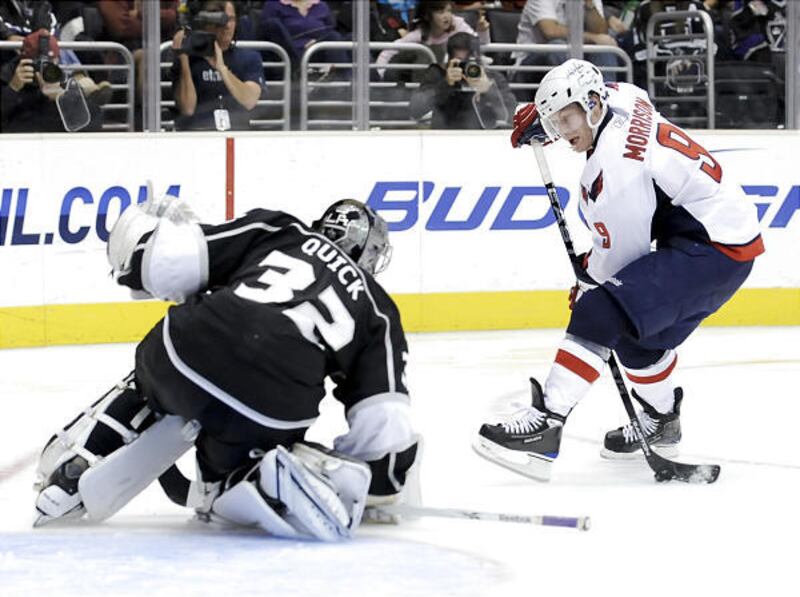 Washington's Brendan Morrison (9) takes a shot on Los Angeles goalie Jonathan Quick (32) in the Kings 2-1 win.