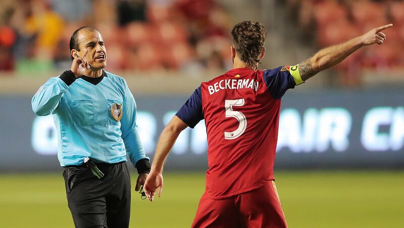 Real Salt Lake midfielder Kyle Beckerman (5) argues with Referee Baldomero Toledo as Real Salt Lake and the Colorado Rapids play at Rio Tinto Stadium in Sandy on Saturday, July 21, 2018.