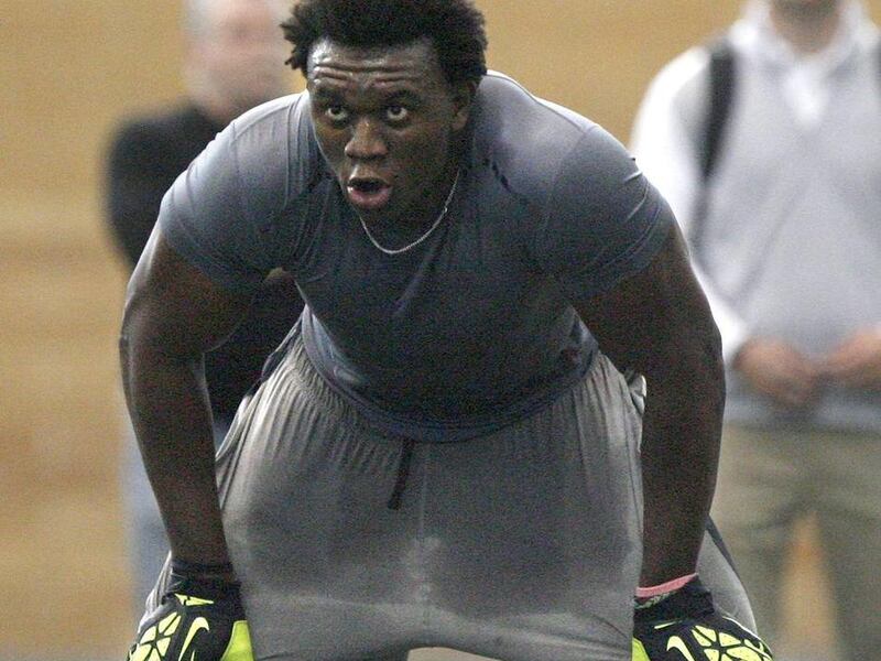 BYU's Ezekiel Ansah runs through drills during the 2013 pro day at BYU in Provo on Thursday, March 28, 2013.
