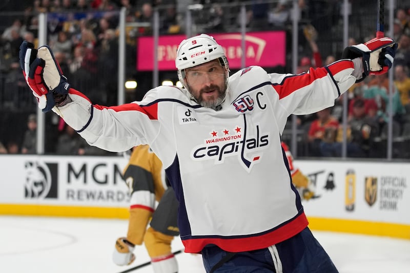 Washington Capitals left wing Alex Ovechkin (8) celebrates after scoring against the Vegas Golden Knights for a hat trick during game Sunday, Nov. 17, 2024, in Las Vegas.