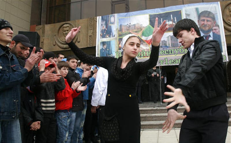 Young people in Chechnya celebrate the cancellation of Russia's counterterrorism regime on Thursday.