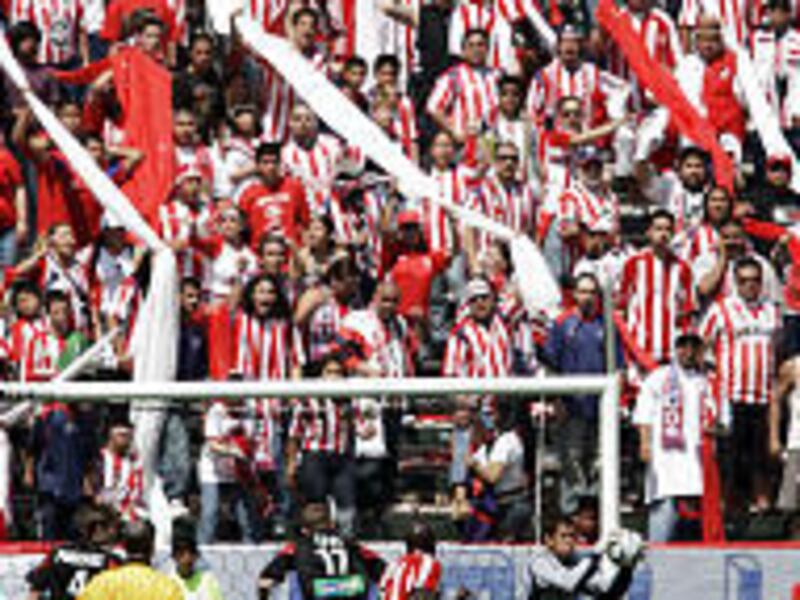 Fans cheer on Chivas USA in its inaugural MLS match Saturday.