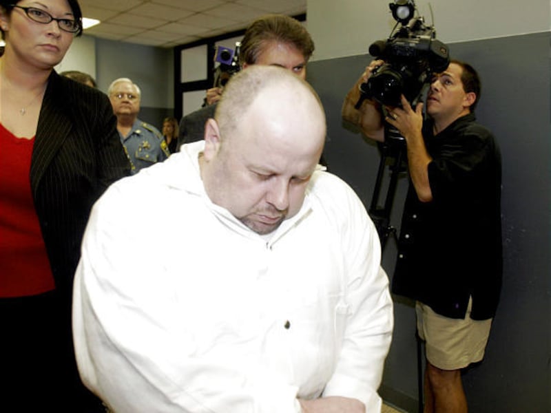 Serial killer Ronald Dominique leaves courtroom in Houma, La., in shackles.