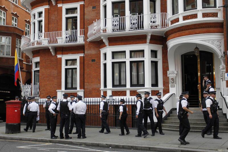 British police officers stand guard outside the Ecuadorian Embassy in central London, Thursday, Aug. 16, 2012 after Ecuadorean Foreign Minister Ricardo Patino announced that he had granted political asylum to WikiLeaks founder Julian Assange. He's won as
