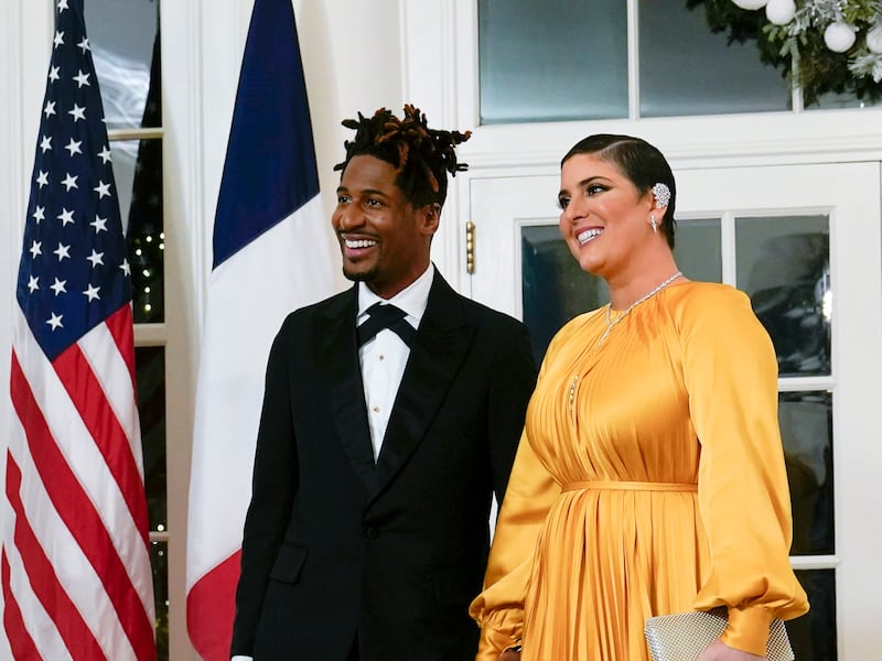 Musician Jon Batiste arrives with his wife Suleika Jaouad for a State Dinner at the White House on Dec. 1, 2022.