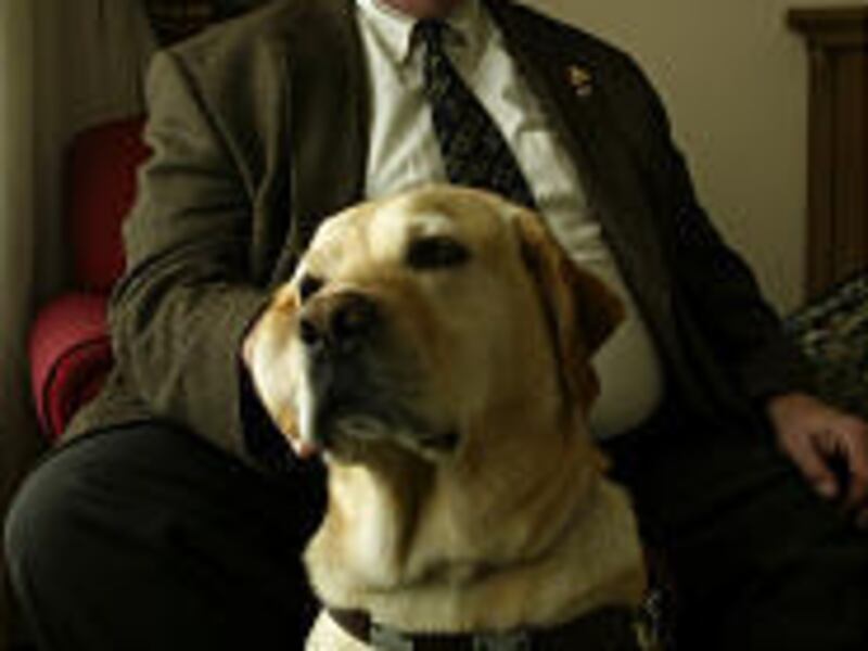 Michael Hingson and his guide dog, Roselle, pose at the Marriott in Park City. He now travels the world sharing his inspirational story.