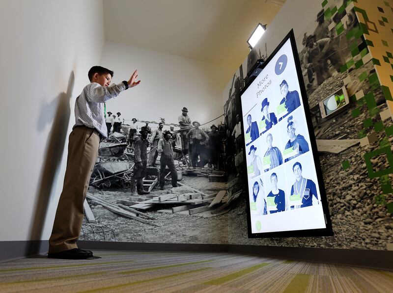 Eric Riddle tries out one of the photo stations as The Church of Jesus Christ of Latter-day Saints and the Family History Library introduce a new 10,139-square-foot, interactive discovery experience in Salt Lake City on Tuesday, Feb. 7, 2017.