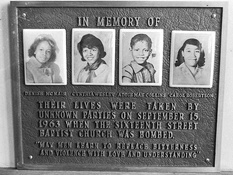This 1977 file photo shows a memorial plaque at the Sixteenth Street Baptist Church in Birmingham, Ala. for Denise McNair, Cynthia Wesley, Addie Mae Collins and Carole Robertson, the four girls killed in a bombing at the church in 1963.