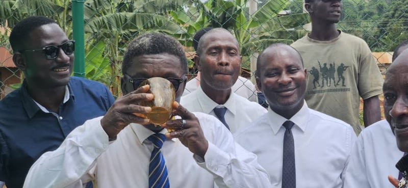 President Prosper Mensah, president of the Ejisu Ghana Stake, drinks a cup of water after the Church's donation of a water borehole in Addokrom, Ghana, on July 22, 2025.