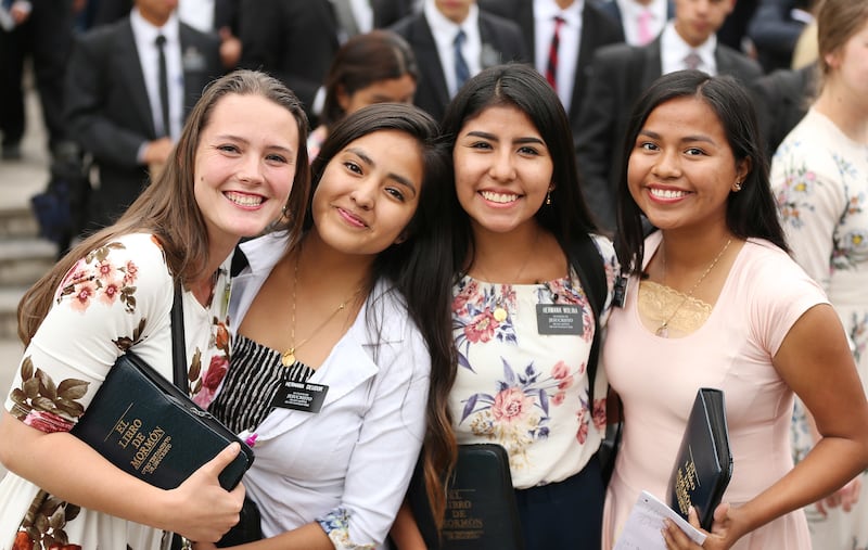 Sister missionaries smile after meeting with President Russell M. Nelson of The Church of Jesus Christ of Latter-day Saints in Lima, Peru on Oct. 20, 2018.