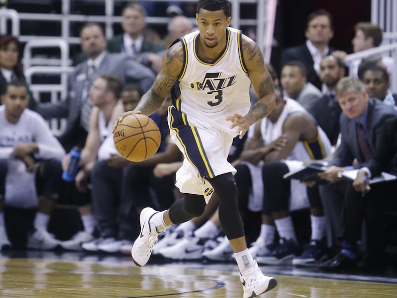 Utah Jazz guard Trey Burke (3) brings the ball up court in the second half during NBA preseason basketball game Thursday, Oct. 22, 2015, in Salt Lake City. The Jazz won 98-78. (AP Photo/Rick Bowmer)